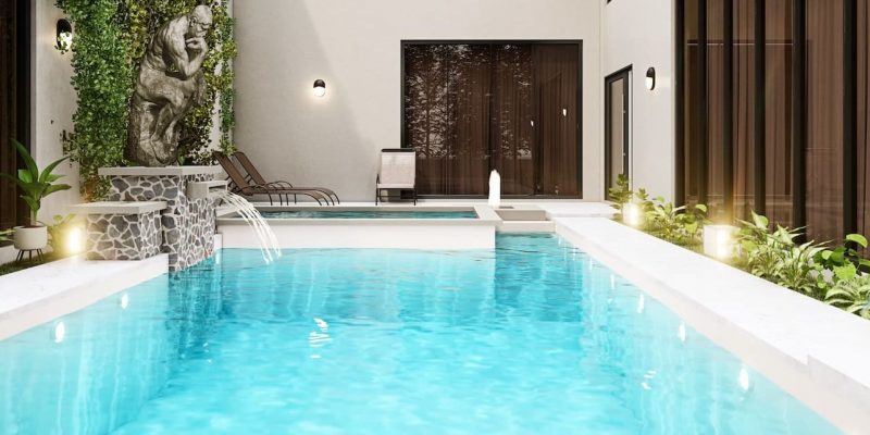 swimming pool near green trees during daytime